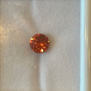 Padparadscha Crystal by Swarovski.  Round